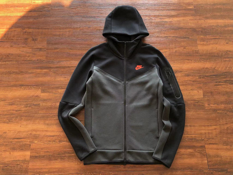 CONJUNTO NIKE TECH FLEECE WINDRUNNER: CHAQUETA Y PANTALÓN EN NEGRO, GRIS Y NARANJA.